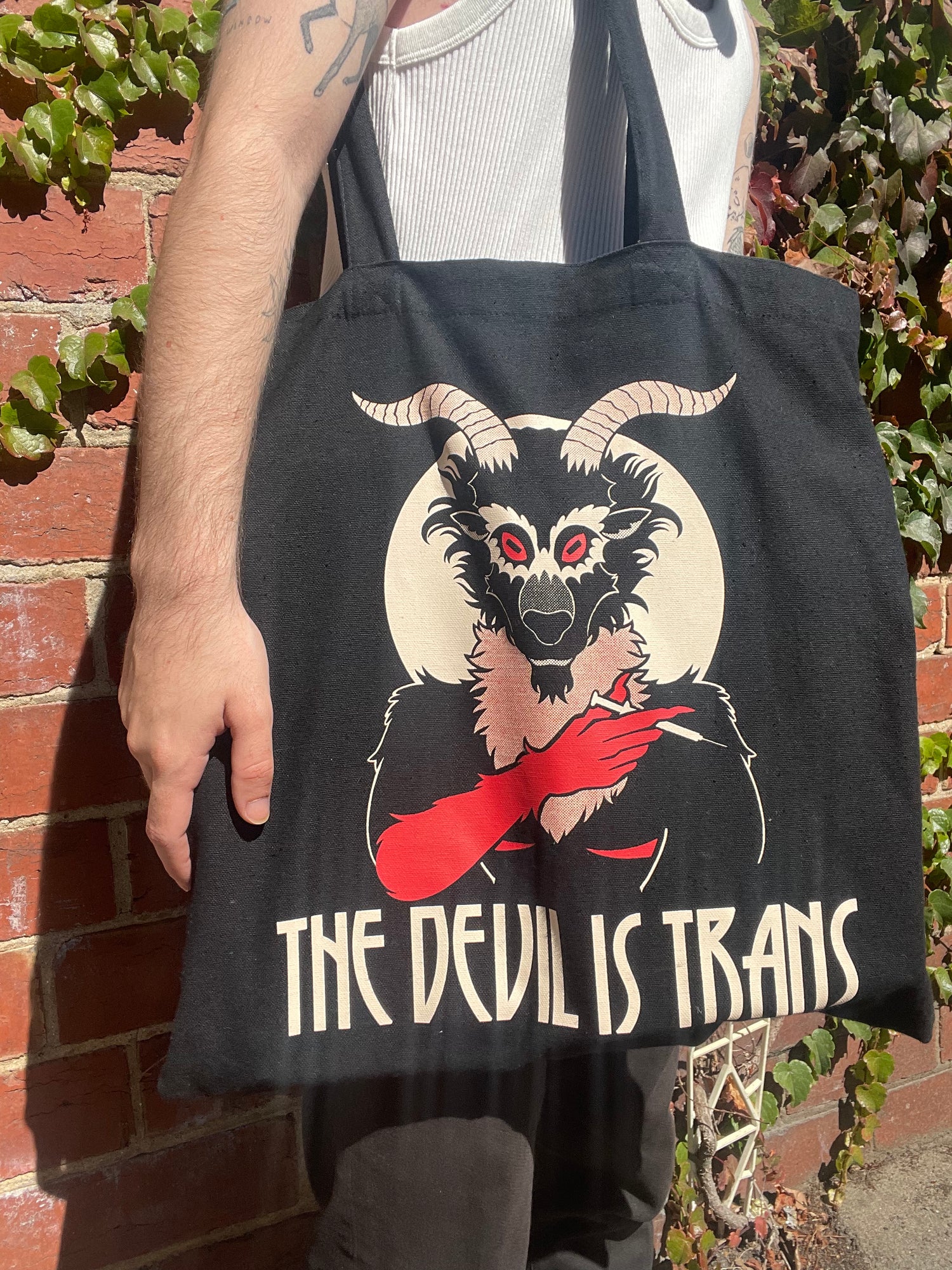 Devil is trans Tote Bag