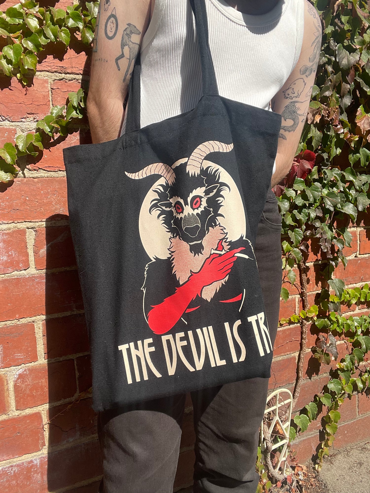 Devil is trans Tote Bag